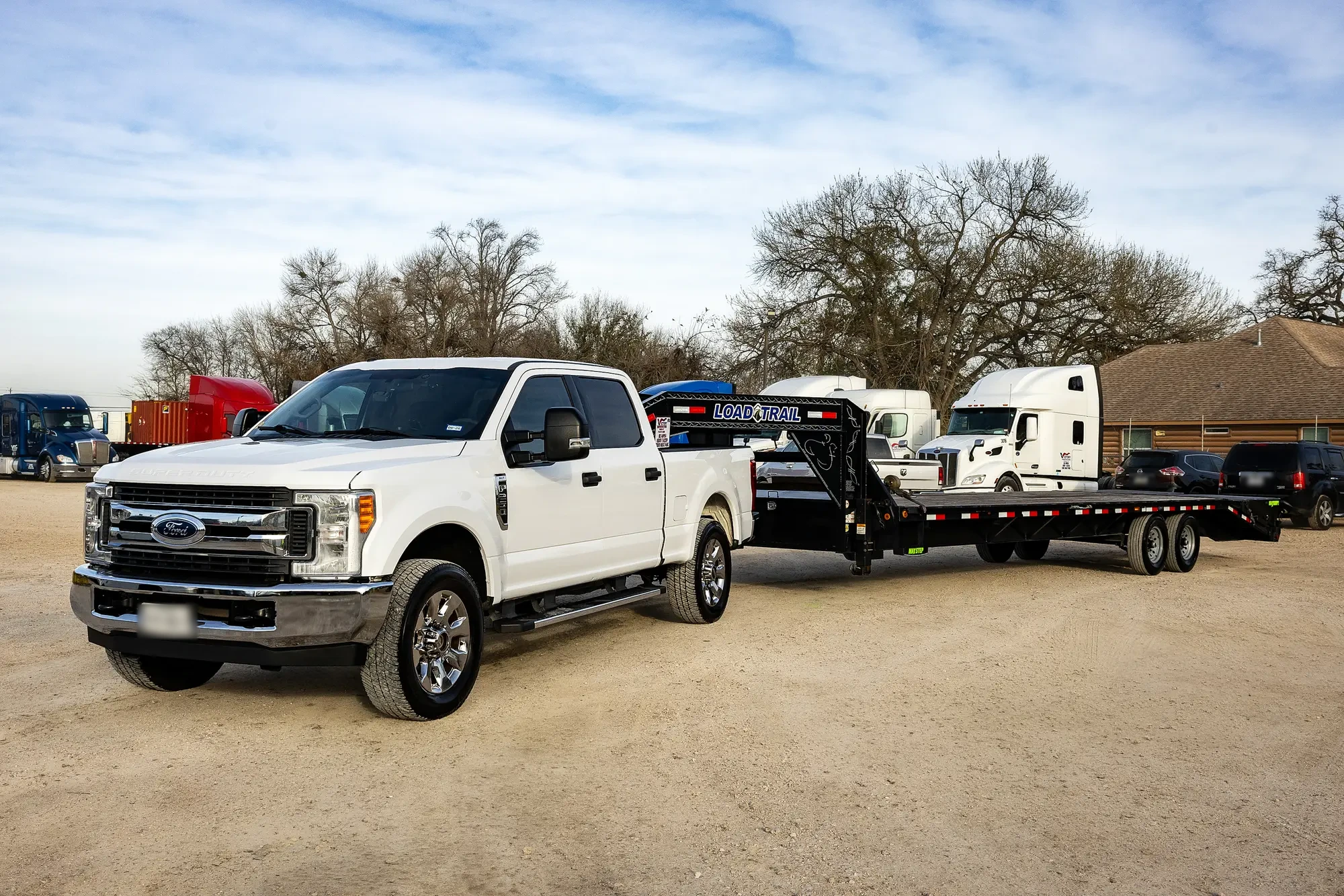 Open-deck trailer representing Victory Brokerage specialized capacity